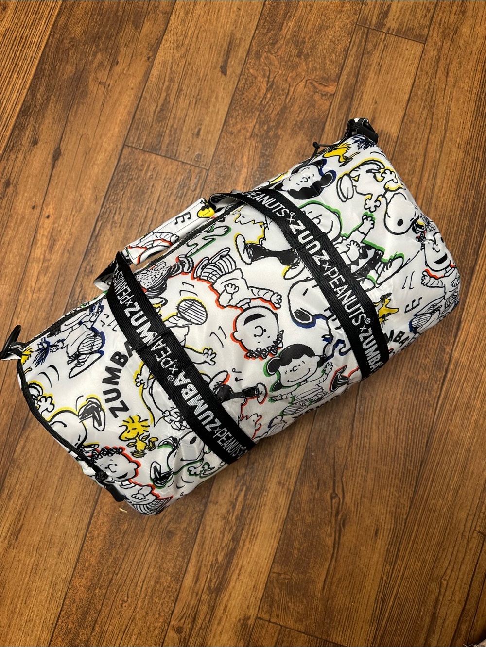 Zumba Fitness White Graphic Crossbody Duffel with Multicolor Cartoon Print